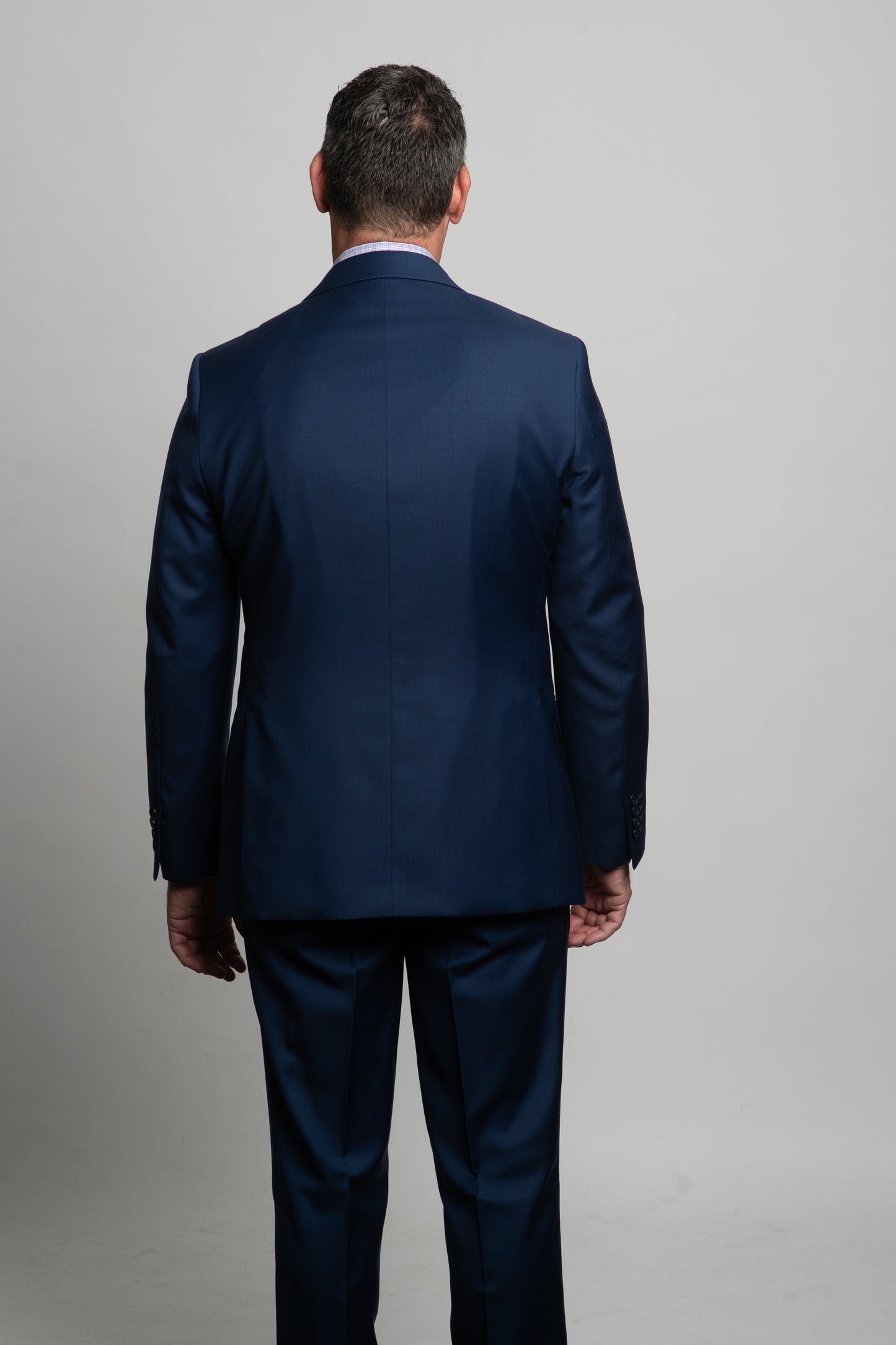 man in PINOT cobalt suit